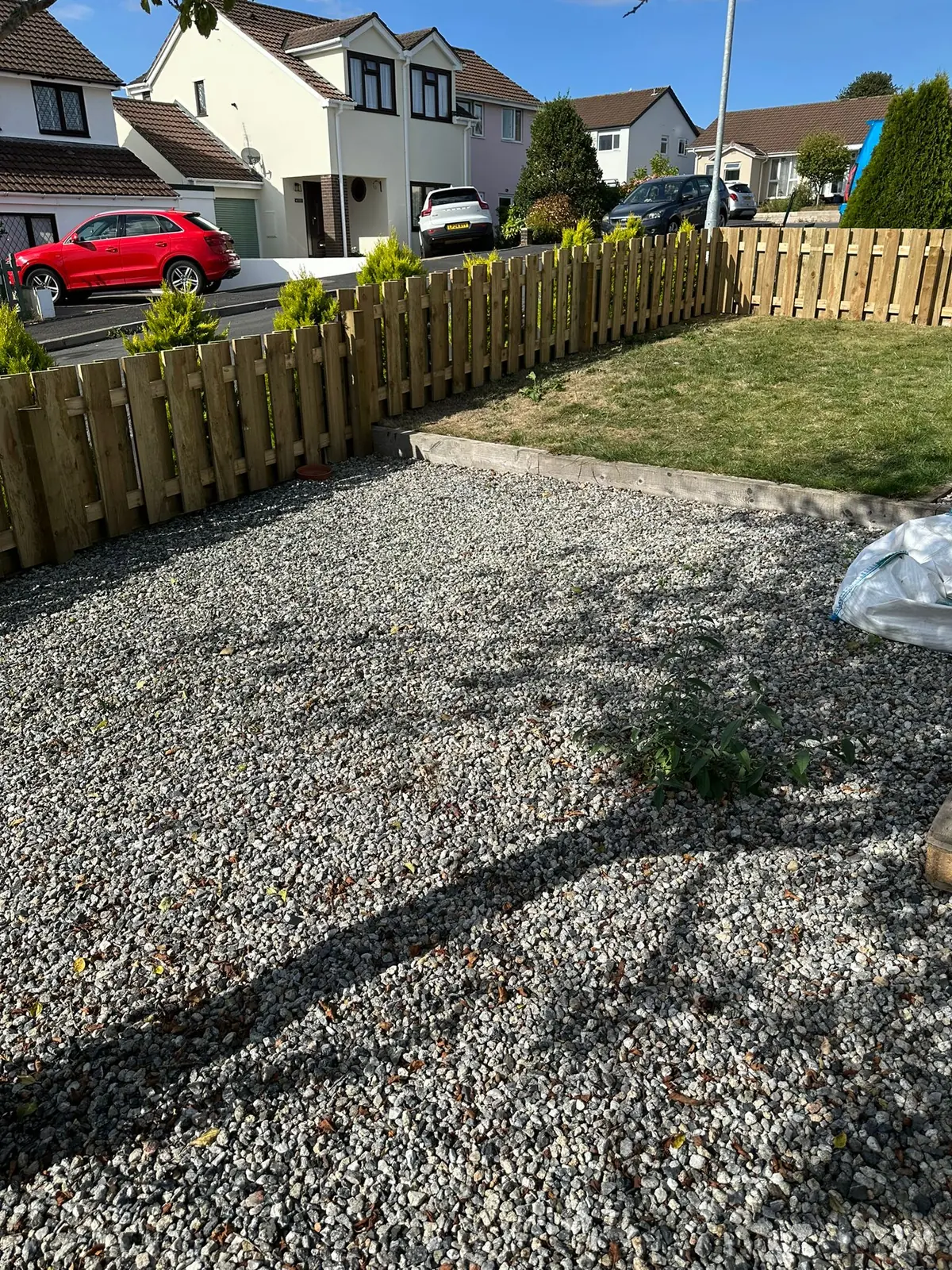 Finished hit and miss fence with matching gate on an exposed Torrington hilltop
